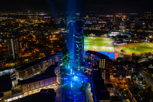 ‘East Side Plaza Num. 1 tower in Gunwharf Quays with blue lighting’ aerial drone photo print