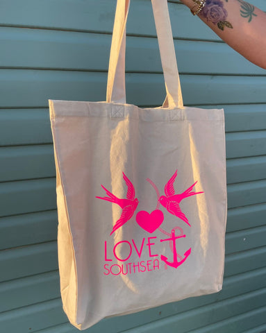 Love Southsea branded tote bad in khaki with bright pink logo